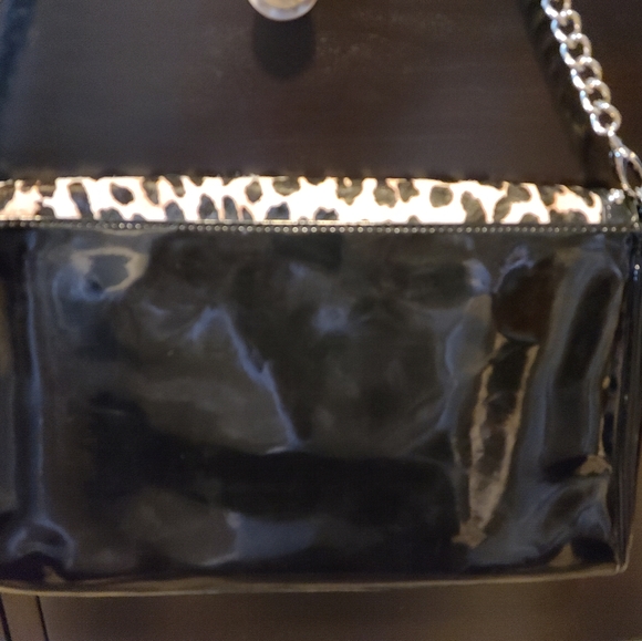 NWOT White House Black Market Haircalf Animal Print Clutch